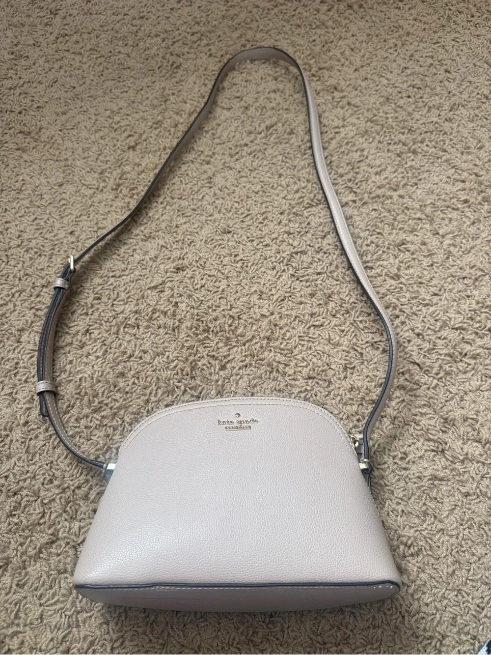 kate spade pebble leather dome crossbody in light taupe